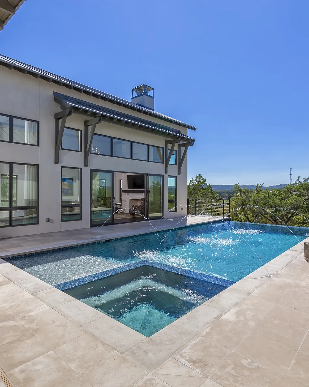 Backyard pool and spa built by Dynamic Custom Homes